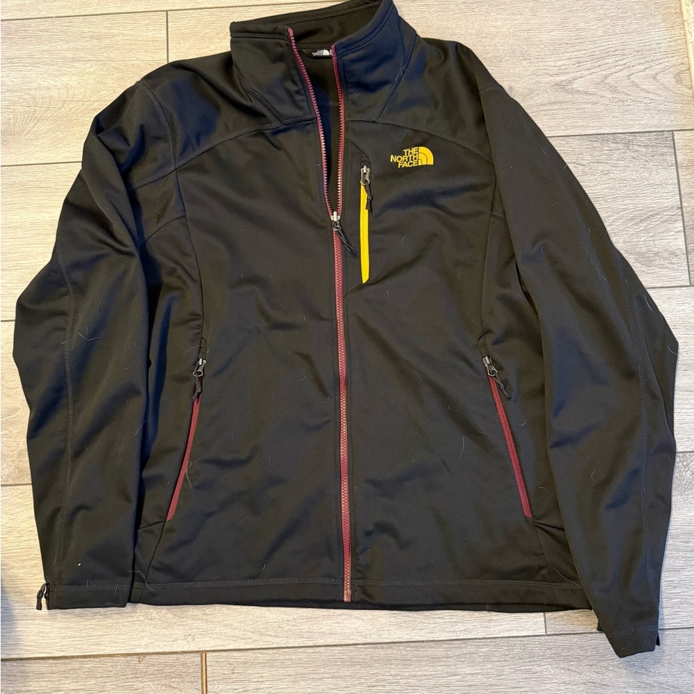 The North Face Black Softshell Jacket with Yellow Chest Stripe